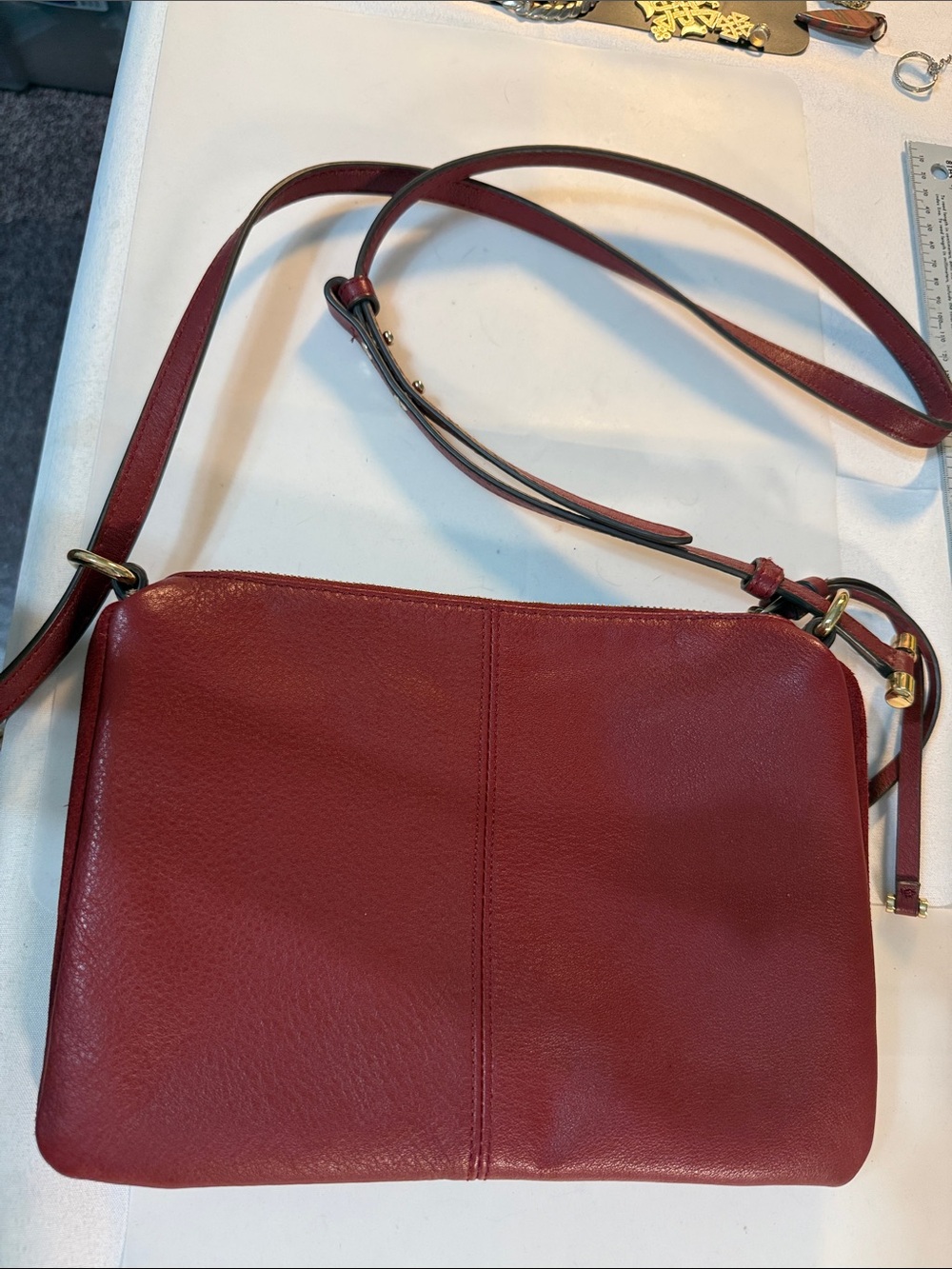 Vince Camuto Burgundy Leather Crossbody with Gold Logo 7” x 10” strap 22” appx - Picture 2 of 13